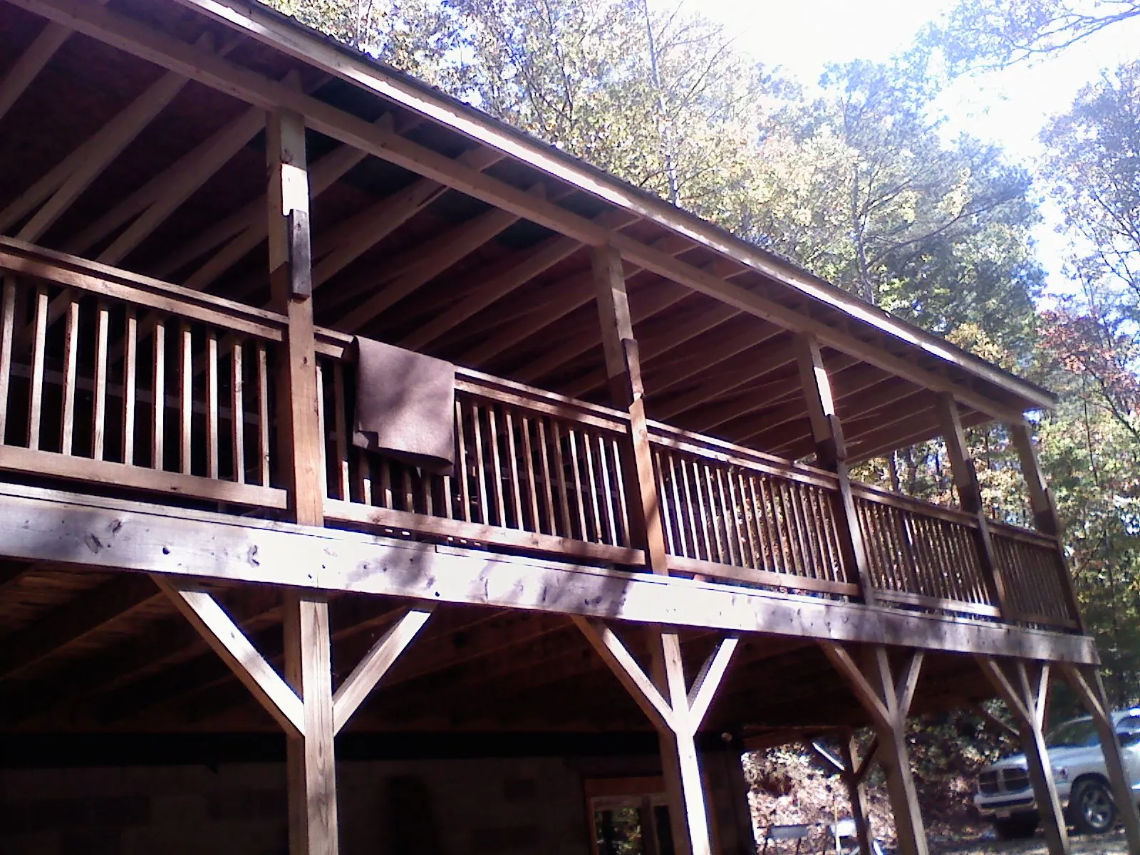 Timber framing under a new elevated porch and deck — Roof Leak Repair in Branford by Roofing Brothers